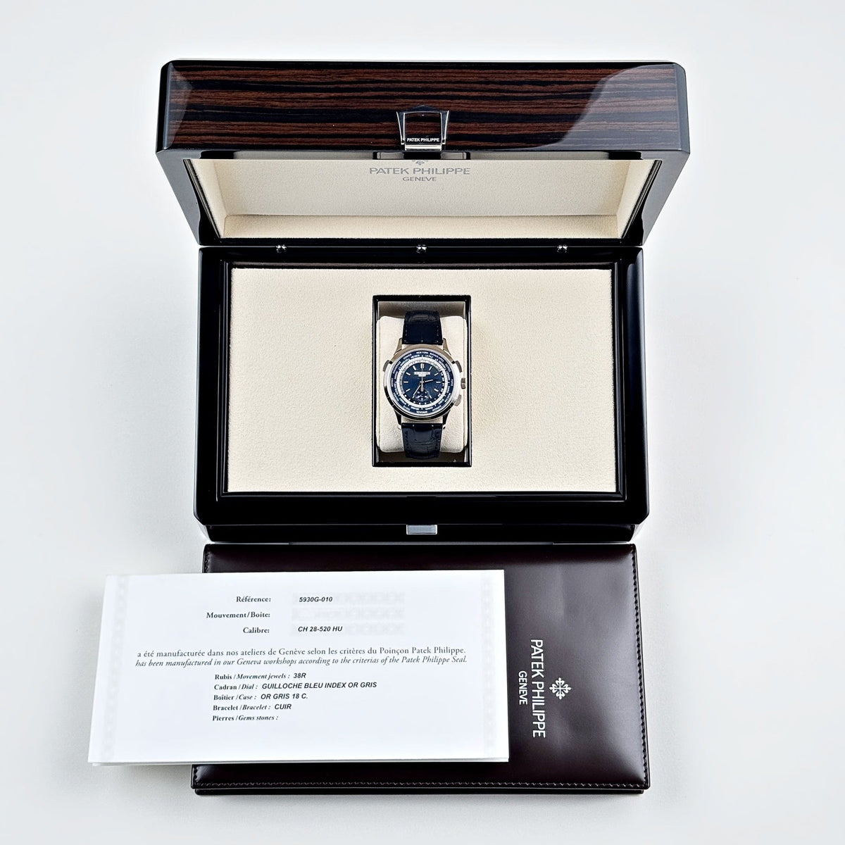 Patek Philippe Complications 5930G-010 World Time Flyback Chronograph White Gold Blue Dial