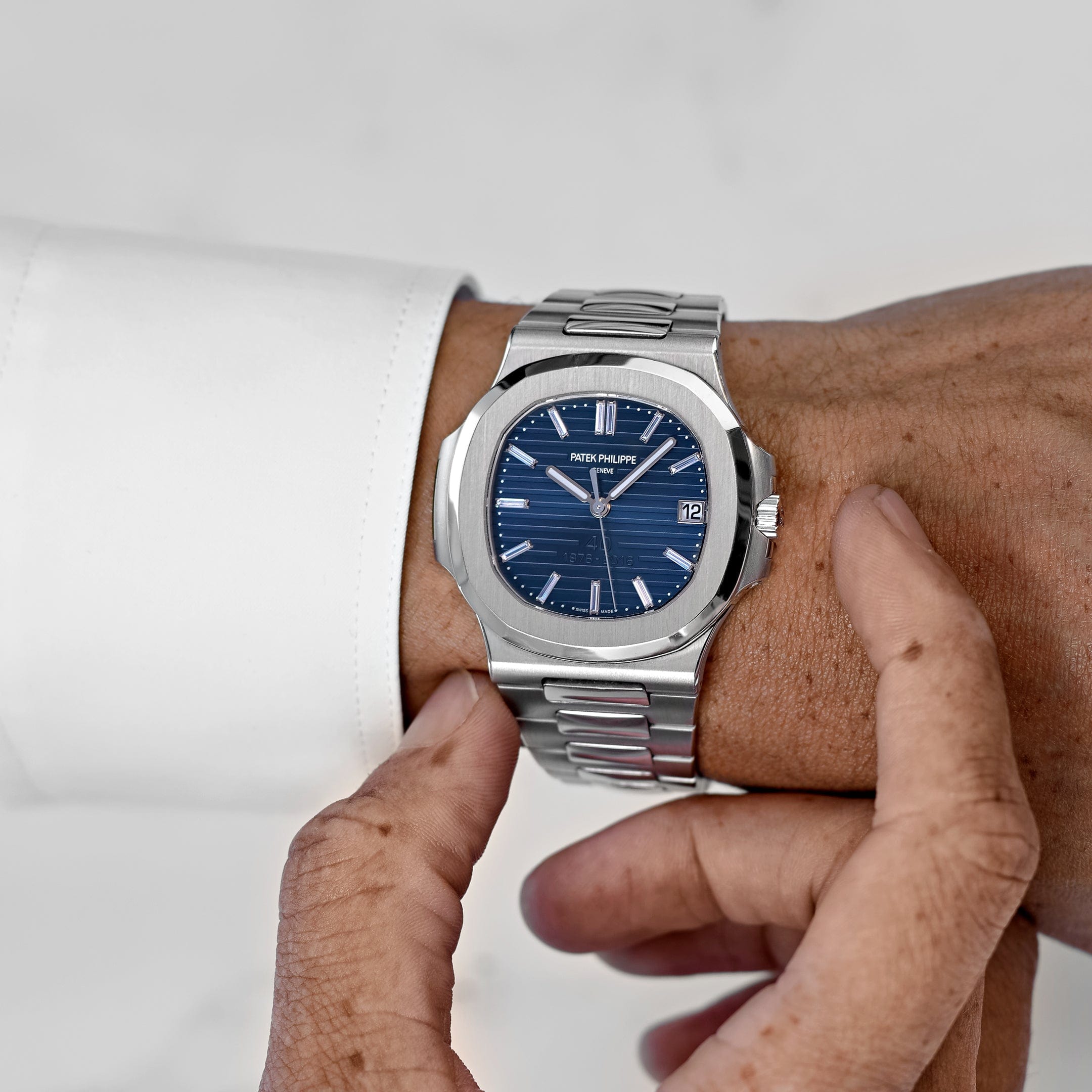 Patek Philippe Nautilus 5711/1P-001 40th Anniversary Platinum Blue Diamond Baguette Dial Limited Edition