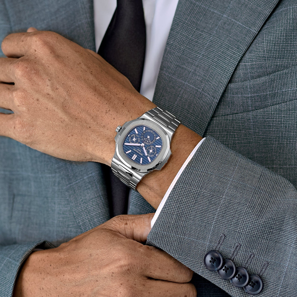 Patek Philippe Nautilus 5740/1G-001 Perpetual Calendar Moon Phases White Gold (2023)