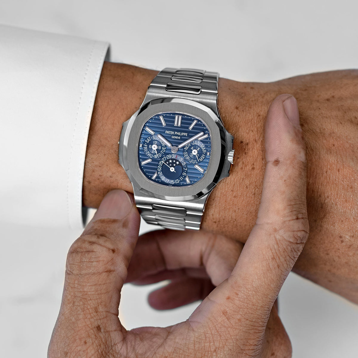 Patek Philippe Nautilus 5740/1G-001 Perpetual Calendar Moon Phases White Gold (2023)