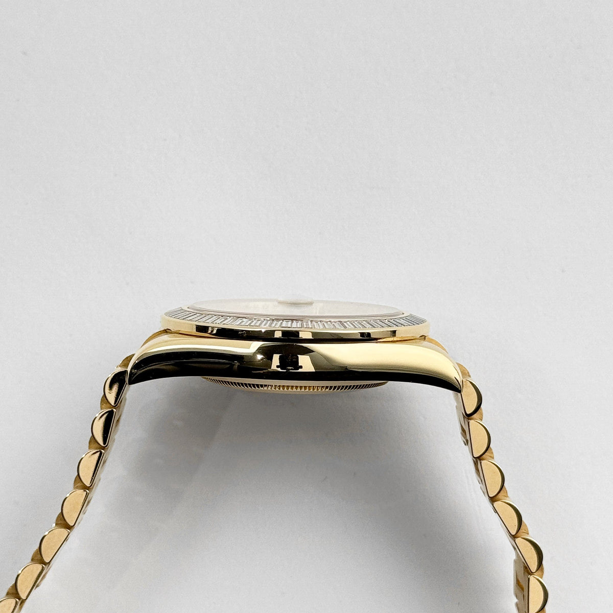 Rolex Day-Date II 218398 Yellow Gold Champagne Ruby Dial Diamond Bezel (2010)