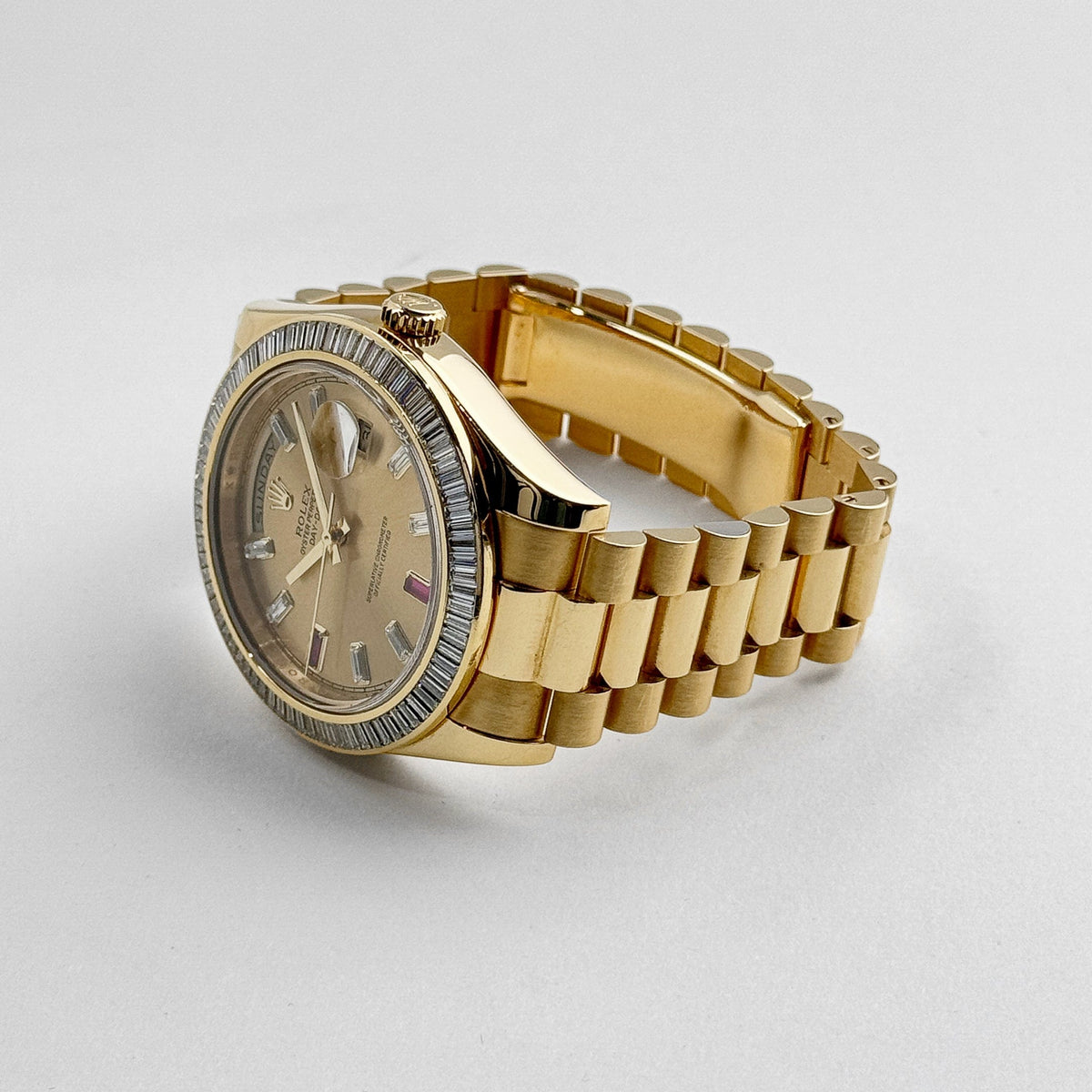 Rolex Day-Date II 218398 Yellow Gold Champagne Ruby Dial Diamond Bezel (2010)