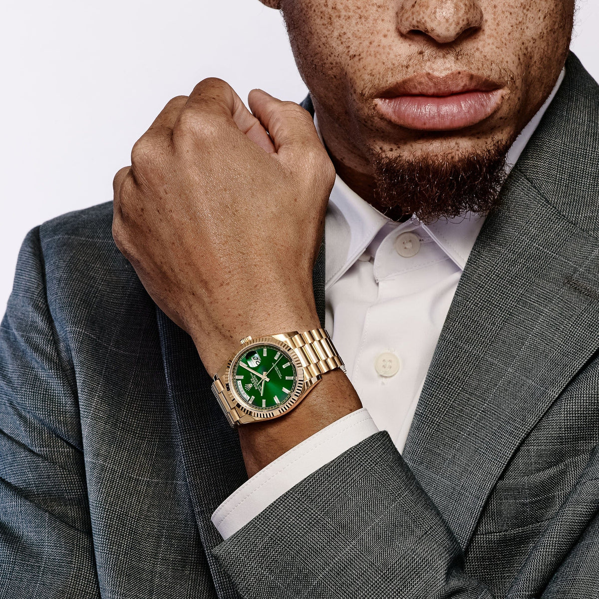 Rolex Day-Date 36 128238 Yellow Gold Green Diamond Baguette Dial (2025)