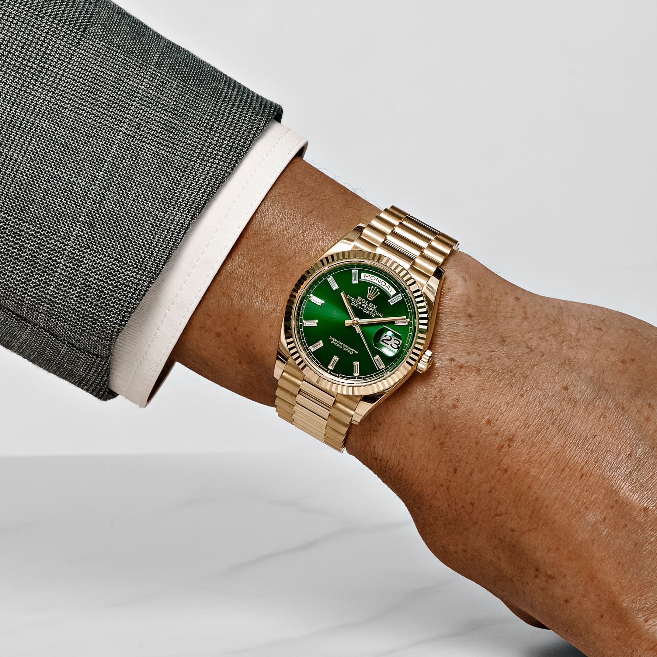 Rolex Day-Date 36 128238 Yellow Gold Green Diamond Baguette Dial (2025)