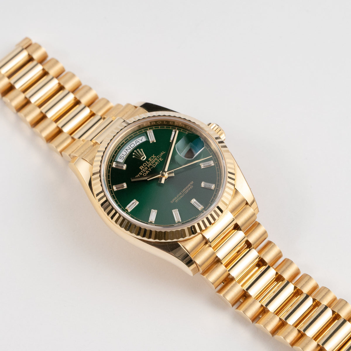 Rolex Day-Date 36 128238 Yellow Gold Green Diamond Baguette Dial (2025)
