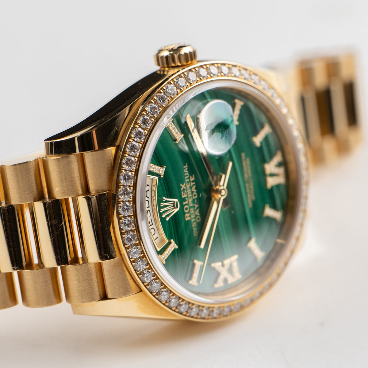 Rolex Day-Date 36 128348RBR Yellow Gold Green Malachite Diamond Roman Numerals Dial Diamond Bezel (2021)