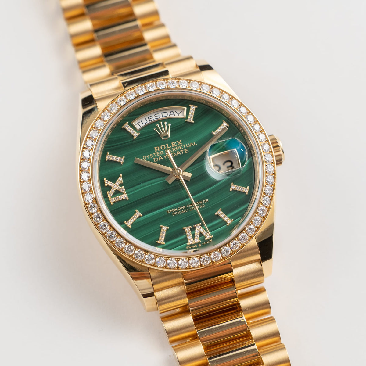 Rolex Day-Date 36 128348RBR Yellow Gold Green Malachite Diamond Roman Numerals Dial Diamond Bezel (2021)