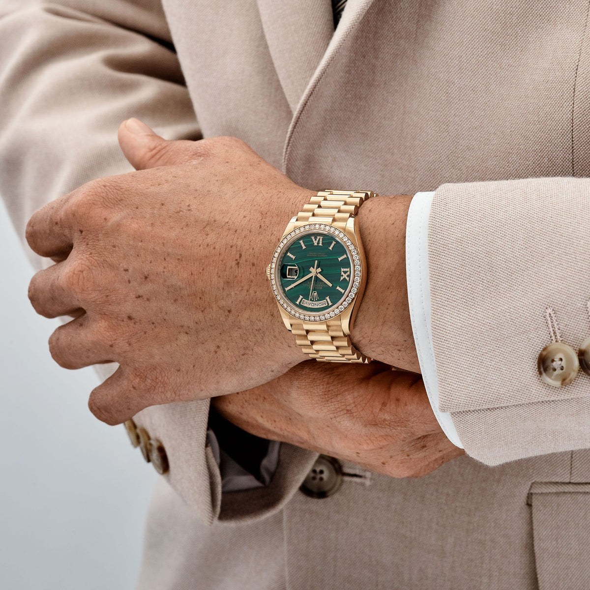 Rolex Day-Date 36 128348RBR Yellow Gold Green Malachite Diamond Roman Numerals Dial Diamond Bezel (2021)