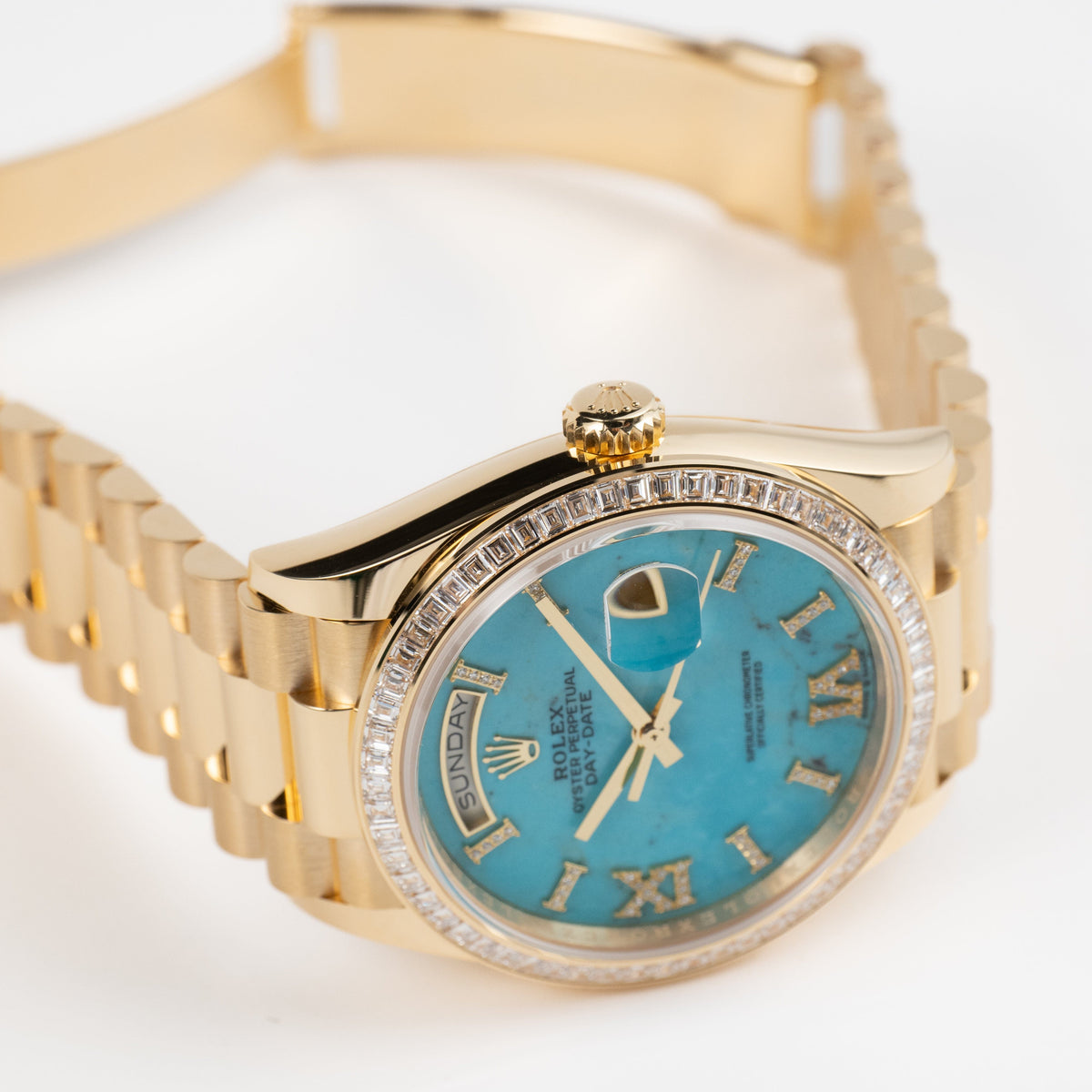 Rolex Day-Date 36 128398TBR Yellow Gold Turquoise Stone Diamond Roman Numerals Dial Diamond Bezel