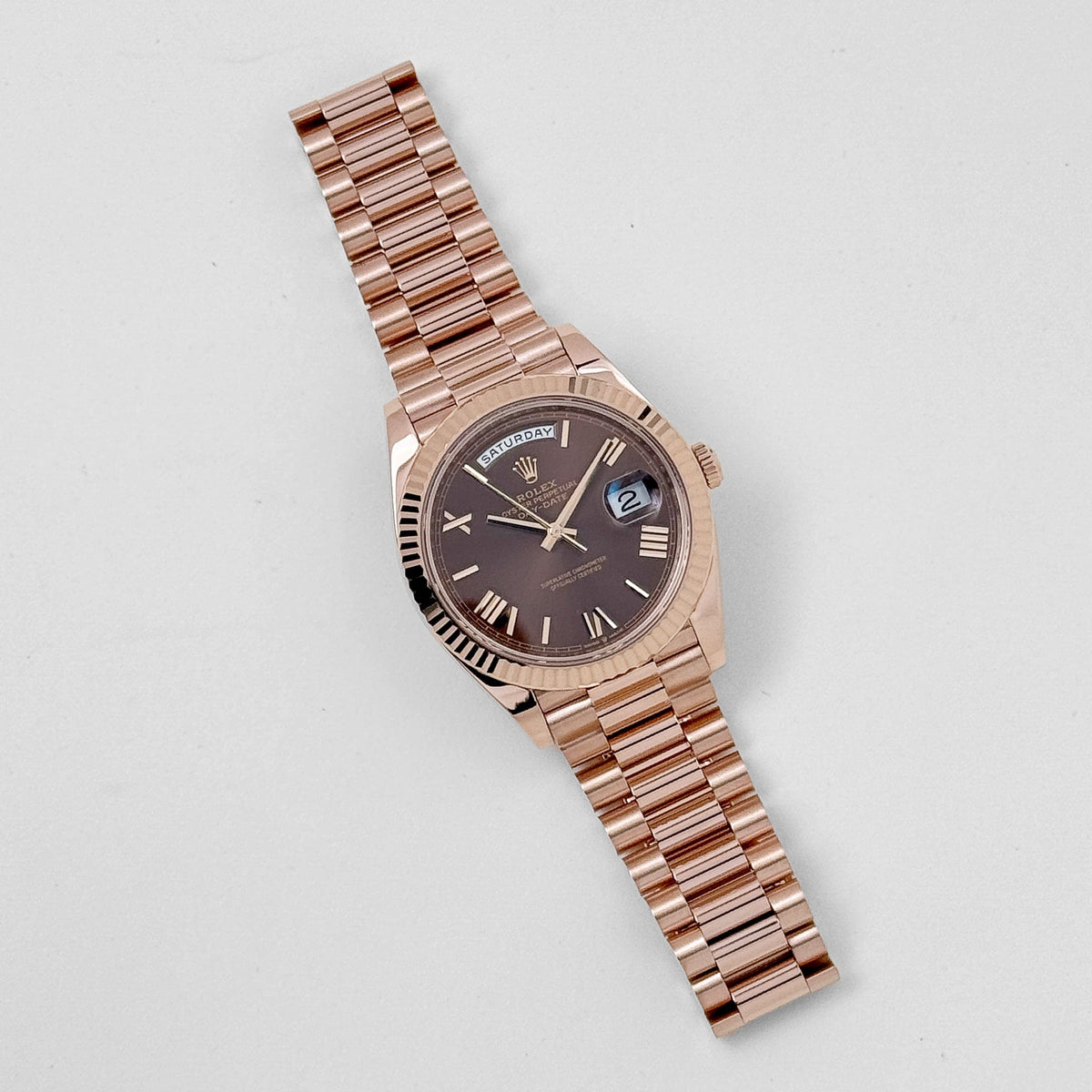 Rolex Day-Date 40 228235 Rose Gold Chocolate Roman Numerals Dial