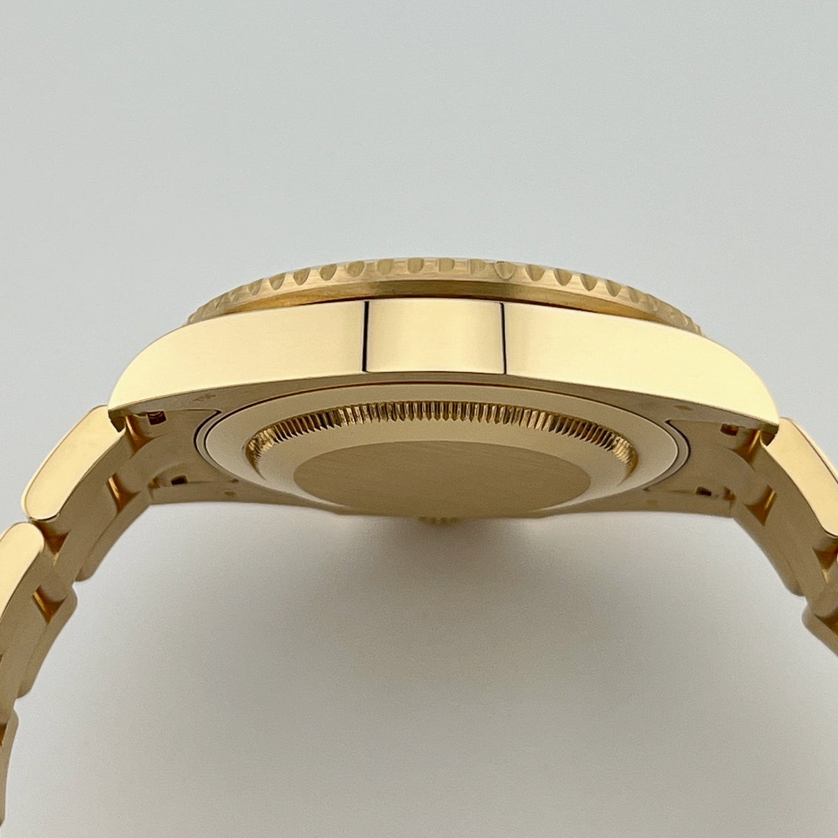 Rolex GMT-Master II 116718LN Yellow Gold Green Dial Black Bezel
